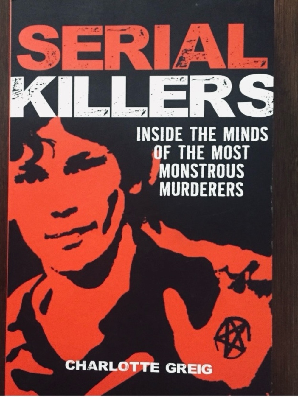 Serial Killers by Charlotte Greig - Bold Black & Orange Cover